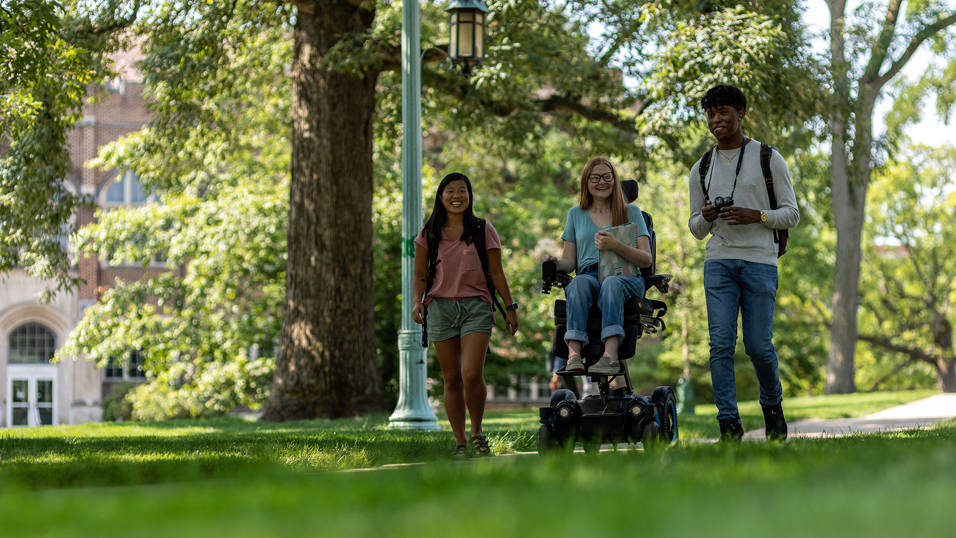 Students having a conversation on campus