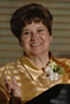 Professional headshot of Julie Louis-Benaglio