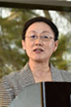Professional headshot of Qian Huang
