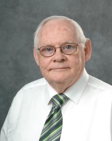 Professional headshot of Truman Surbrook